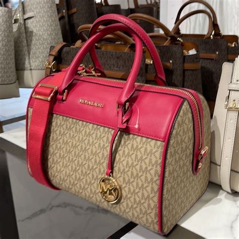 michael kors duffle purse|michael kors pink suitcase.